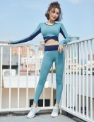 Autumn and winter contrasting navel yoga clothing female fast dry chest pad long -sleeved peach pants two -piece set