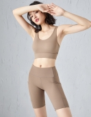 Spring and summer yoga sports set Female cross -shoulder strap sports chest pocket penta pants two -piece set