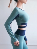 Yoga clothing female spring and summer cross -shoulder strap yoga long -sleeved sports fitness navel top contains chest pads