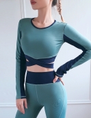 Yoga clothing female spring and summer cross -shoulder strap yoga long -sleeved sports fitness navel top contains chest pads