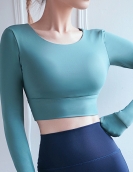 Spring and summer hollow beauty backbuilding chest pad yoga shirt sexy revealing belly button shockproof exercise fitness short top