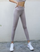 Spring and summer nude high -waist hip -hip fitness yoga pants female fast -drying high bounce peach hip sports tight pants